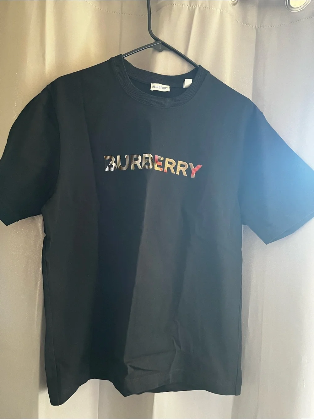 Burberry Black Logo Tee with Beige Plaid and Red Accents